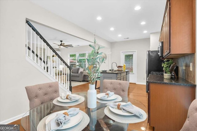 3607 Archgate Ct, Alpharetta, GA 30004 - dining space featuring stairs, recessed lighting, light wood-style floors, and a ceiling fan