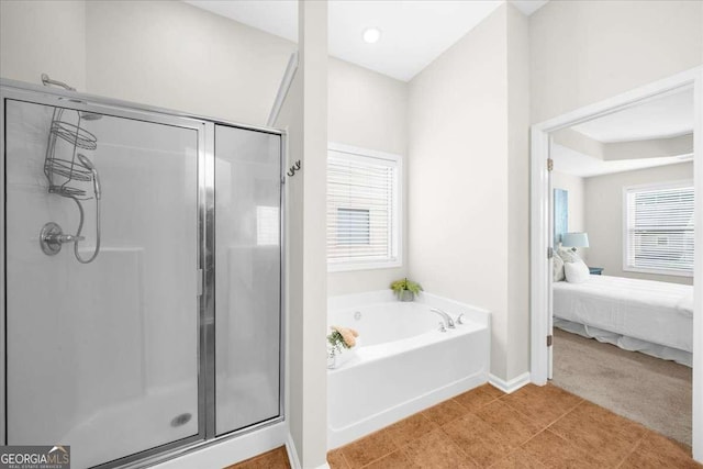 3607 Archgate Ct, Alpharetta, GA 30004 - ensuite bathroom featuring a stall shower and a garden tub