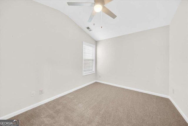 3607 Archgate Ct, Alpharetta, GA 30004 - spare room featuring vaulted ceiling, ceiling fan, and carpet floors