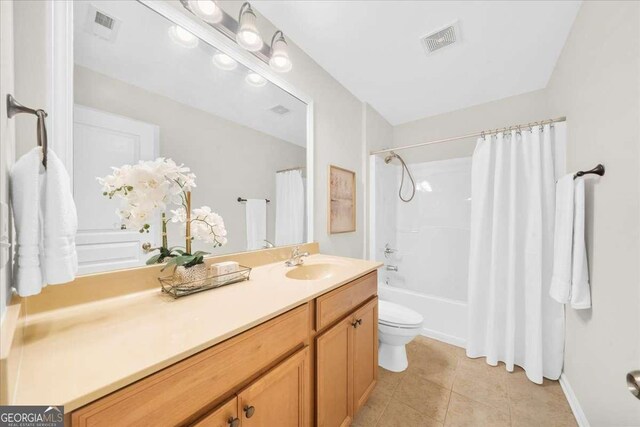 3607 Archgate Ct, Alpharetta, GA 30004 - full bathroom with vanity, tile patterned flooring, and shower / bath combo with shower curtain