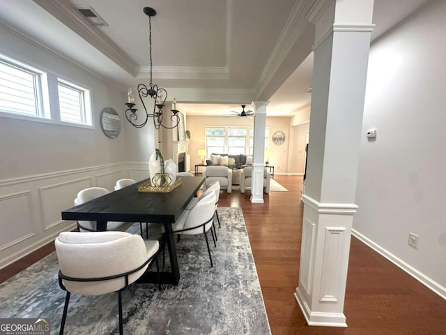 3607 Archgate Ct, Alpharetta, GA 30004 - dining space featuring decorative columns, dark wood finished floors, ceiling fan, healthy amount of natural light, and crown molding
