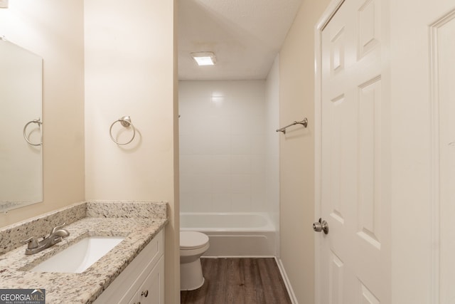 4669 Birch Ridge Trl, Stone Mountain, GA 30083 - bathroom featuring vanity, wood finished floors, and washtub / shower combination