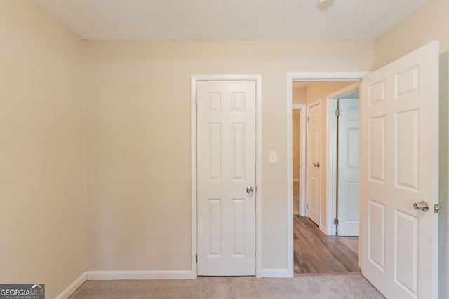 4669 Birch Ridge Trl, Stone Mountain, GA 30083 - unfurnished bedroom featuring light colored carpet