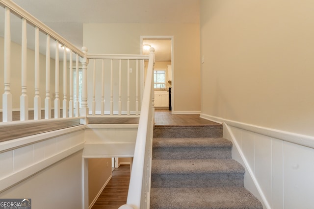 4669 Birch Ridge Trl, Stone Mountain, GA 30083 - staircase with wood finished floors and baseboards