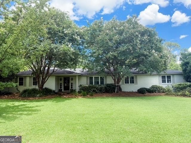507 S College St, Metter, GA 30439 - ranch-style home featuring a front yard