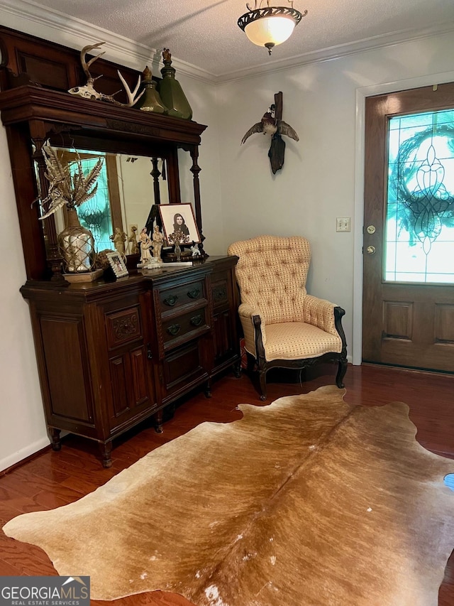 507 S College St, Metter, GA 30439 - entrance foyer featuring crown molding and wood finished floors