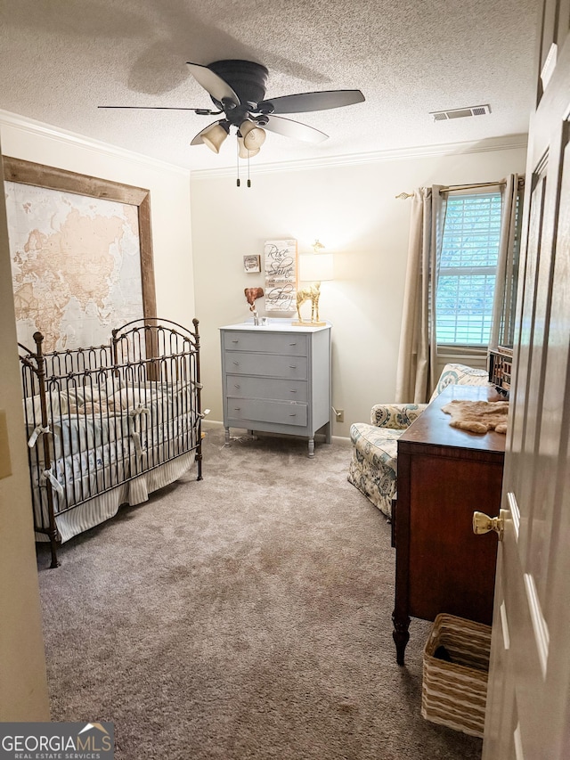 507 S College St, Metter, GA 30439 - bedroom featuring a textured ceiling, ornamental molding, carpet flooring, and a ceiling fan
