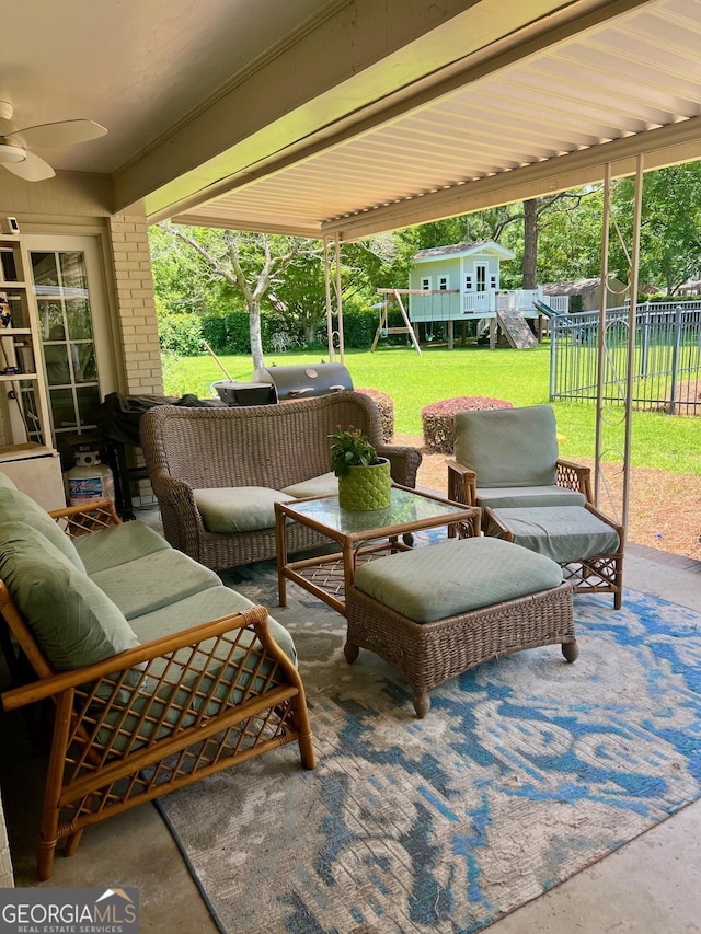 507 S College St, Metter, GA 30439 - view of patio / terrace with a playground, an outdoor living space, and a ceiling fan