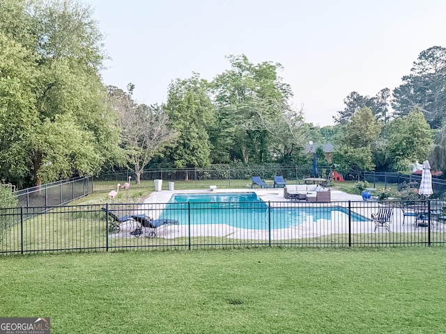 507 S College St, Metter, GA 30439 - community pool with a patio area and view of scattered trees