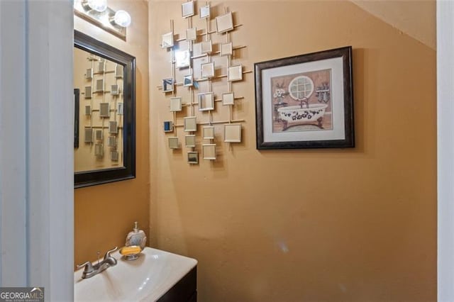 8566 Jamestown Way, Jonesboro, GA 30238 - half bathroom with a sink