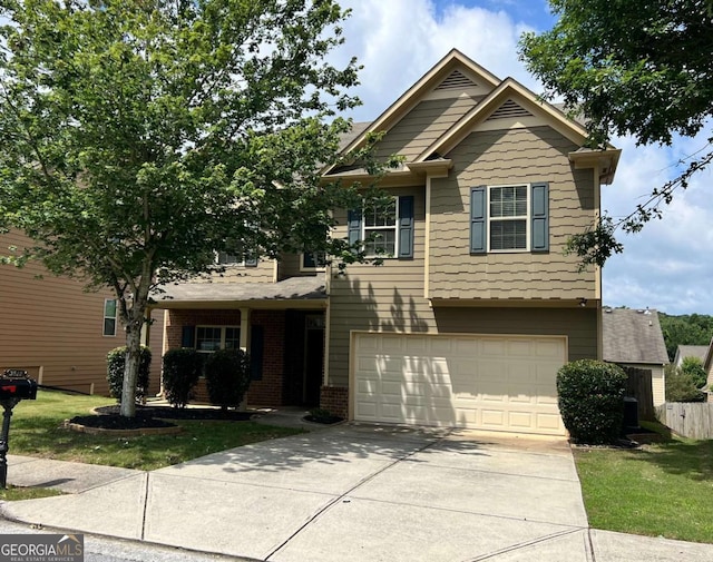 3522 Fallen Oak Dr, Buford, GA 30519 - view of front facade with a garage, concrete driveway, brick siding, and a front yard
