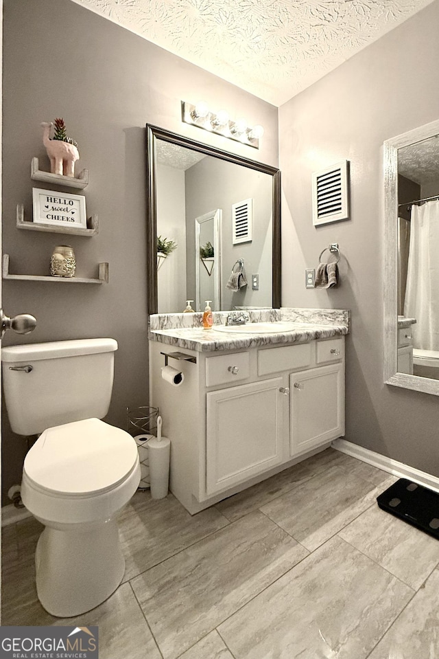 110 Waterloo Dr, Mount Airy, GA 30563 - bathroom with vanity and a textured ceiling