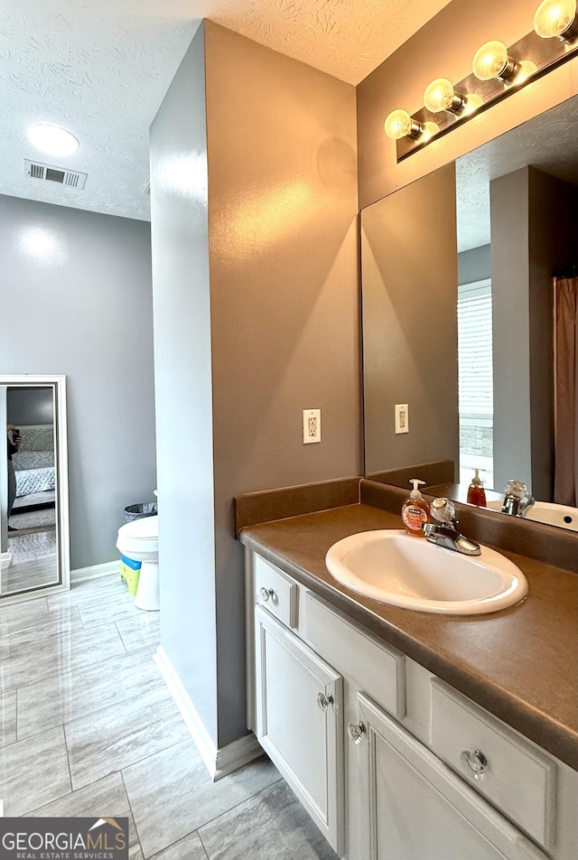 110 Waterloo Dr, Mount Airy, GA 30563 - full bath with a textured ceiling and vanity