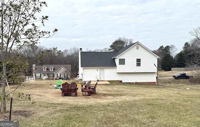 110 Waterloo Dr, Mount Airy, GA 30563 - back of property featuring a lawn and roof with shingles
