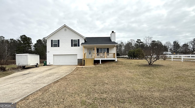 110 Waterloo Dr, Mount Airy, GA 30563 - view of front of house featuring a chimney, concrete driveway, an attached garage, a porch, and a shingled roof