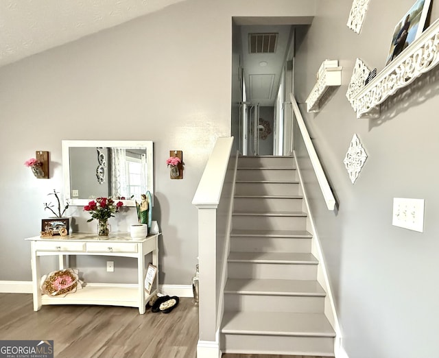 110 Waterloo Dr, Mount Airy, GA 30563 - stairs featuring wood finished floors and baseboards