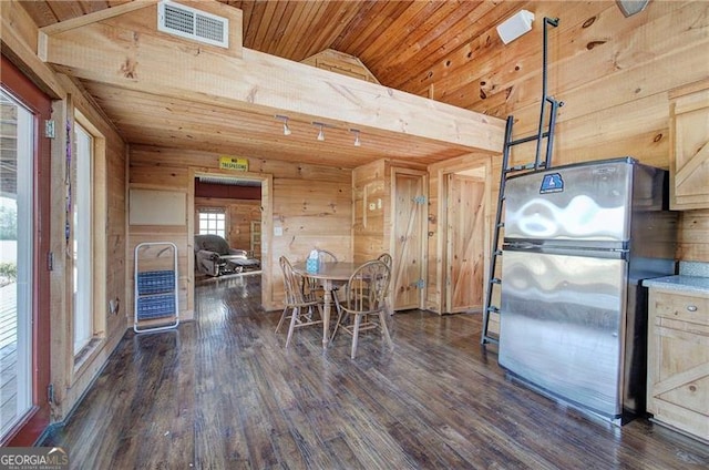 1195 Grady Rd, Rockmart, GA 30153 - dining room with wooden ceiling, vaulted ceiling, wood walls, and dark wood-style flooring