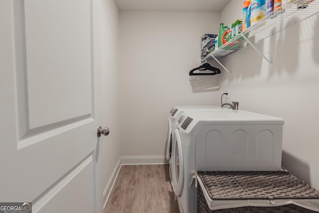 82 Castlemoor Loop, Adairsville, GA 30103 - washroom featuring light wood finished floors and washing machine and dryer