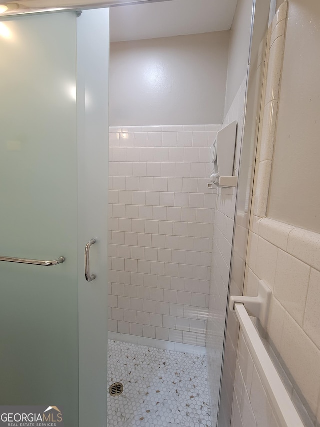 4157 Cedar Valley Ln, Conley, GA 30288 - full bath with a stall shower and tile walls