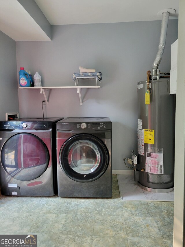 4157 Cedar Valley Ln, Conley, GA 30288 - laundry room with water heater, independent washer and dryer, and baseboards