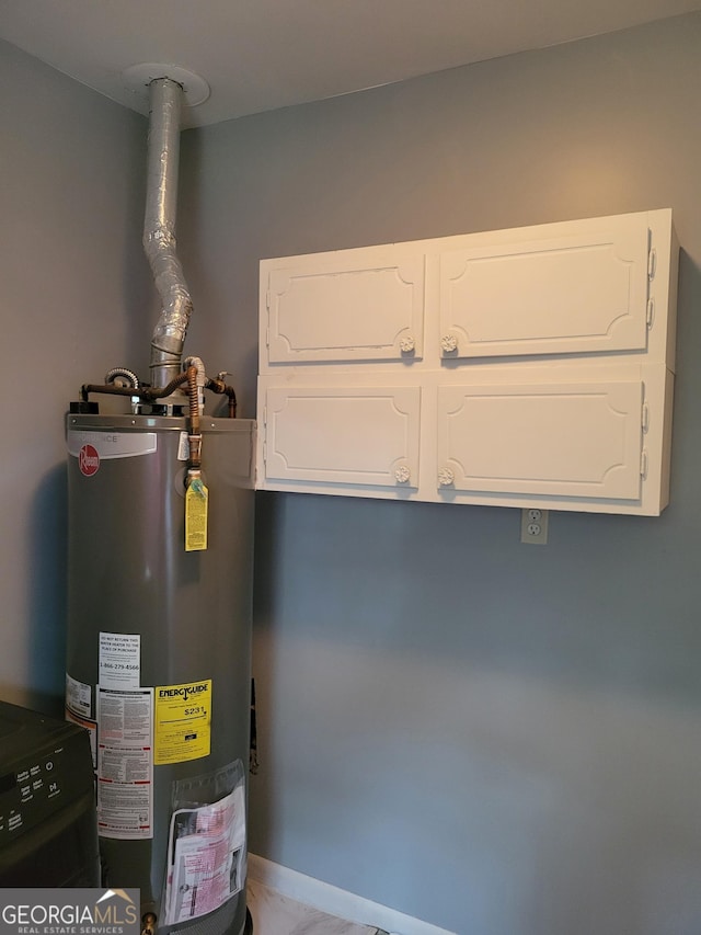 4157 Cedar Valley Ln, Conley, GA 30288 - utility room featuring water heater