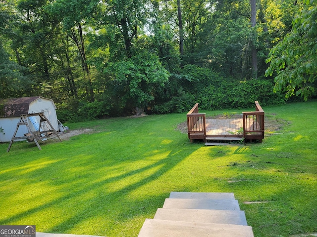4157 Cedar Valley Ln, Conley, GA 30288 - view of grassy yard featuring a wooden deck