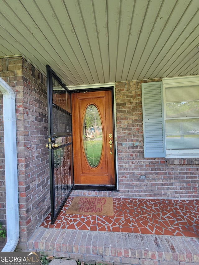 4157 Cedar Valley Ln, Conley, GA 30288 - view of exterior entry featuring brick siding