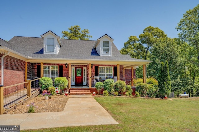637 Lakeview Dr, Newborn, GA 30056 - cape cod house with brick siding, a front yard, and roof with shingles