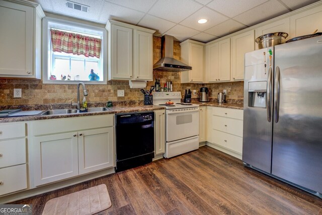 637 Lakeview Dr, Newborn, GA 30056 - kitchen with stainless steel refrigerator with ice dispenser, wall chimney range hood, black dishwasher, electric stove, and dark wood-style flooring