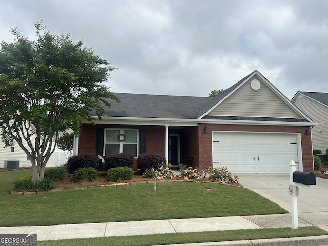 804 Village Pl, Loganville, GA 30052 - ranch-style home with brick siding, concrete driveway, a garage, central air condition unit, and a front lawn