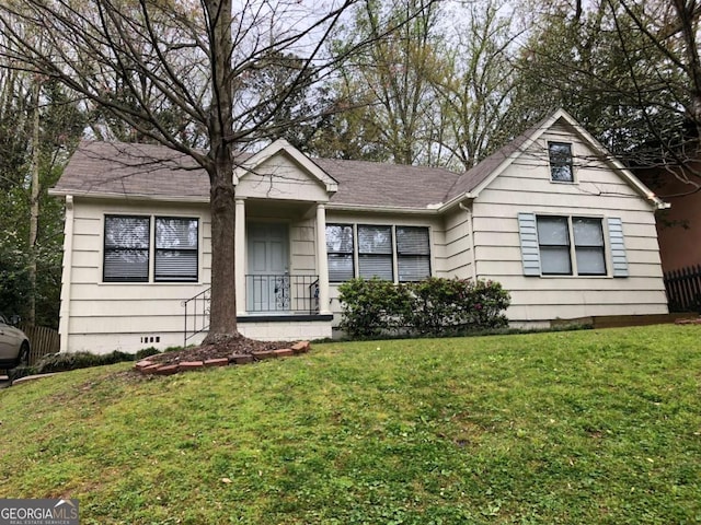 901 Cumberland Rd, Atlanta, GA 30306 - ranch-style house with a front yard and roof with shingles