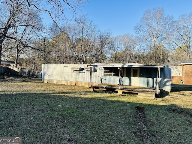 225 Bell St, Covington, GA 30016 - back of property featuring a wooden deck