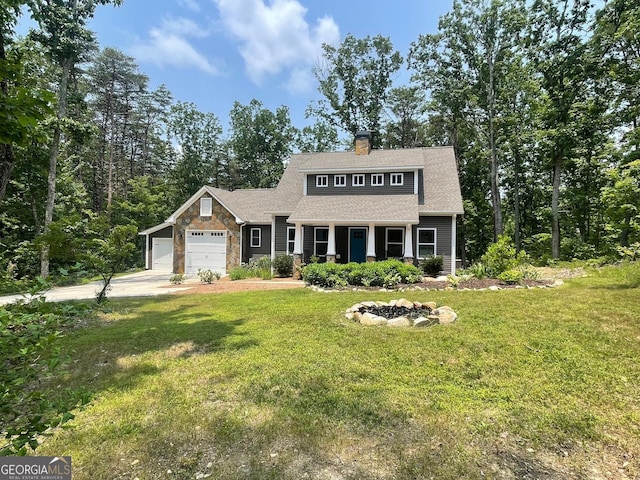 400 Mulberry Cir, Jasper, GA 30143 - view of front facade with a garage, a front yard, concrete driveway, stone siding, and a chimney