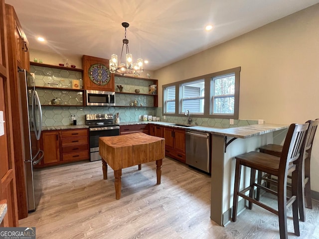 400 Mulberry Cir, Jasper, GA 30143 - kitchen with stainless steel appliances, open shelves, a peninsula, tasteful backsplash, and recessed lighting