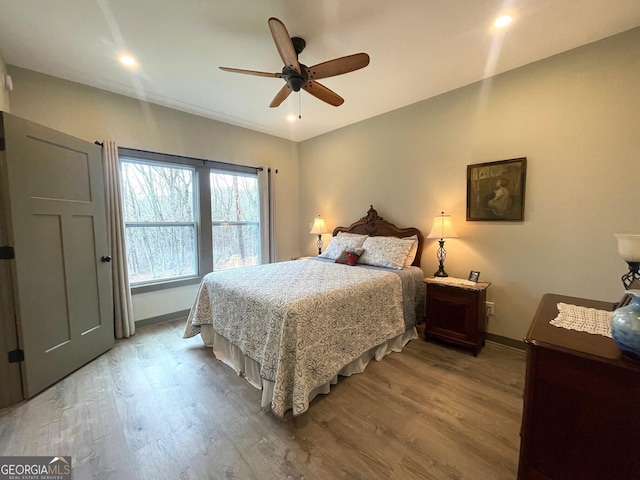 400 Mulberry Cir, Jasper, GA 30143 - bedroom with light wood finished floors, recessed lighting, and a ceiling fan