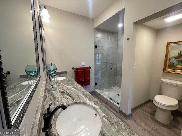 400 Mulberry Cir, Jasper, GA 30143 - bathroom featuring wood finished floors, a stall shower, and double vanity