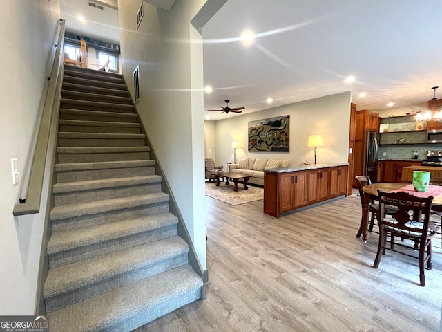 400 Mulberry Cir, Jasper, GA 30143 - staircase featuring wood finished floors, recessed lighting, and a ceiling fan