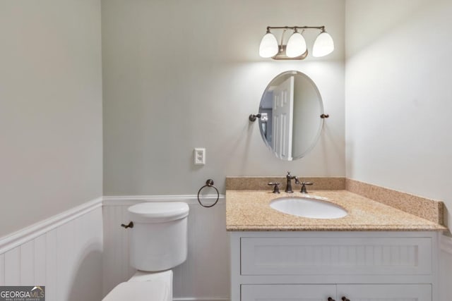405 W Leslie Ct, Woodstock, GA 30188 - bathroom featuring wainscoting and vanity