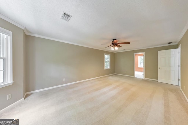 405 W Leslie Ct, Woodstock, GA 30188 - empty room with crown molding, ceiling fan, light colored carpet, and a textured ceiling
