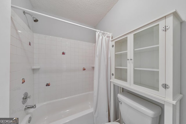 405 W Leslie Ct, Woodstock, GA 30188 - bathroom featuring shower / bathtub combination with curtain and a textured ceiling
