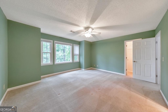 405 W Leslie Ct, Woodstock, GA 30188 - carpeted empty room with ceiling fan and a textured ceiling
