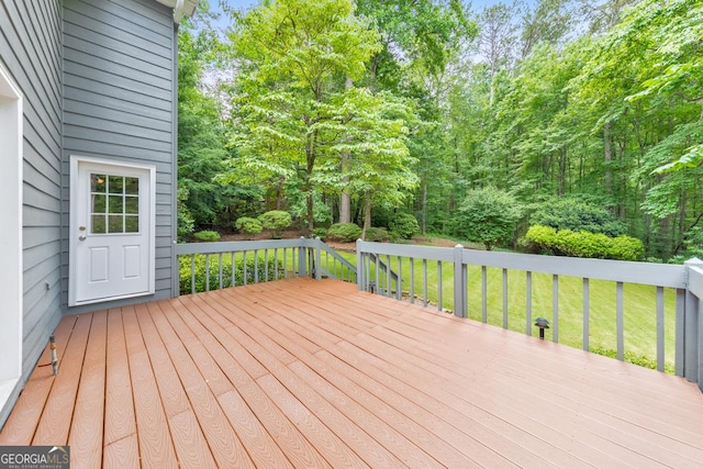 405 W Leslie Ct, Woodstock, GA 30188 - wooden deck with a lawn