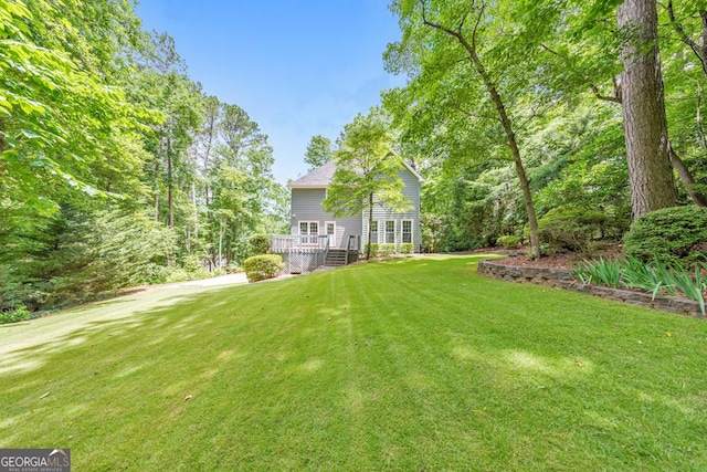 405 W Leslie Ct, Woodstock, GA 30188 - view of grassy yard featuring a deck