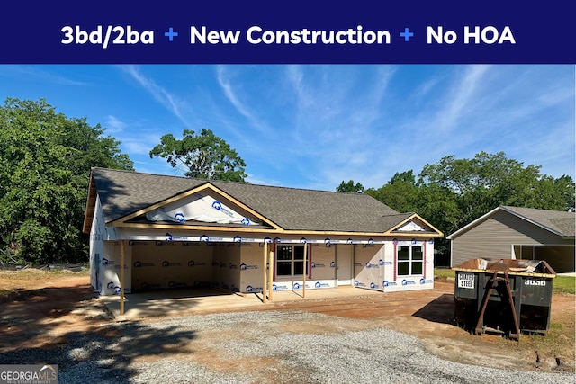 278 Stancil Dr, Toccoa, GA 30577 - unfinished property with driveway, a shingled roof, and an attached garage