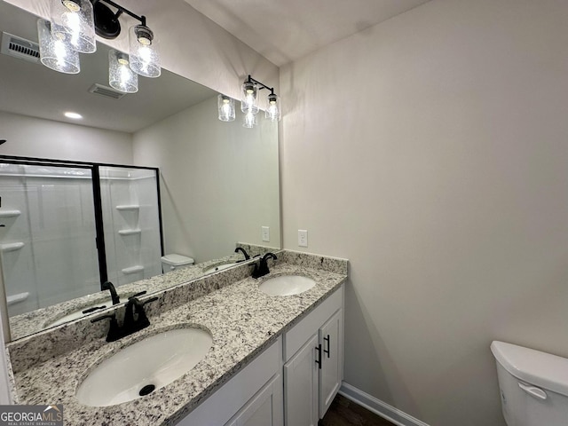 278 Stancil Dr, Toccoa, GA 30577 - full bath featuring toilet, double vanity, a shower with shower door, and baseboards