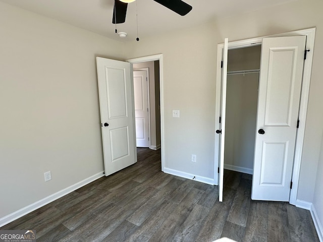 278 Stancil Dr, Toccoa, GA 30577 - unfurnished bedroom featuring dark wood-style flooring, a closet, baseboards, and a ceiling fan