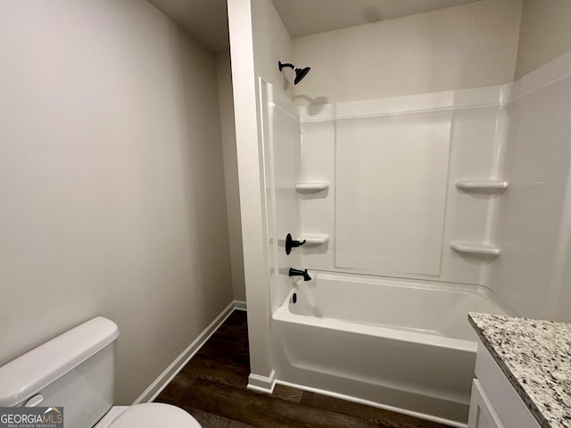 278 Stancil Dr, Toccoa, GA 30577 - full bath with toilet, wood finished floors, baseboards, bathing tub / shower combination, and vanity