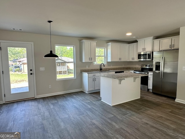278 Stancil Dr, Toccoa, GA 30577 - kitchen with stainless steel appliances, a sink, white cabinets, dark wood-style flooring, and recessed lighting