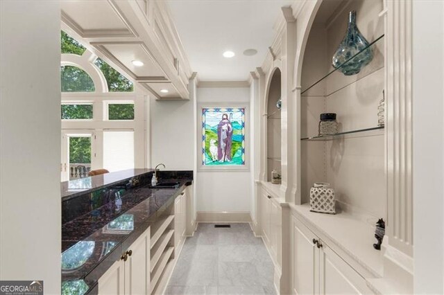 9005 Old Southwick Pass, Alpharetta, GA 30022 - kitchen with white cabinetry and dark stone counters