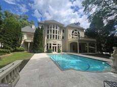9005 Old Southwick Pass, Alpharetta, GA 30022 - swimming pool with a patio area